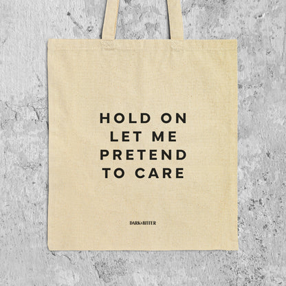 Hold on let me pretend to care Tote bag