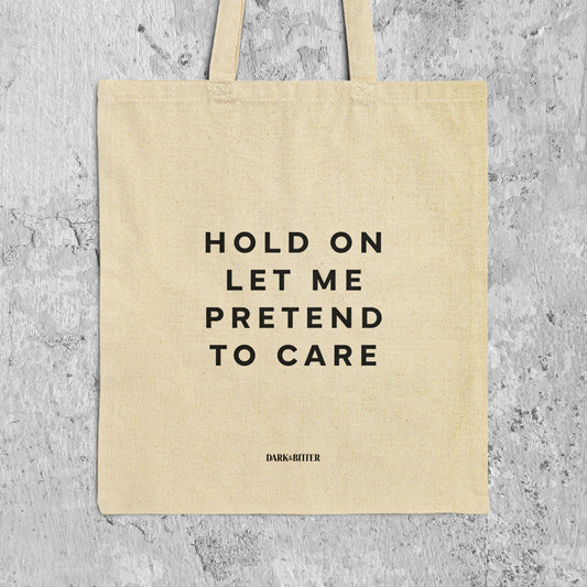 Hold on let me pretend to care Tote bag
